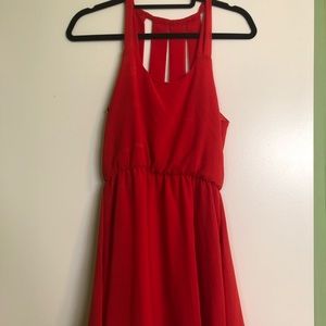 Red dress with cute back and singed.